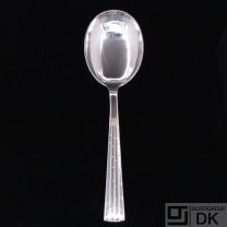 Jens H. Quistgaard. Silver Serving Spoon - Champagne