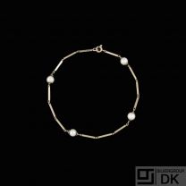 14k Gold Bracelet with Pearls.