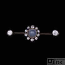Gold Plated Silver Brooch with Diamonds and Star-Sapphire.