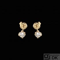 14k Gold Earsticks with Diamonds. Total 0,46 ct.