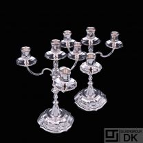 A. Dragsted - Copenhagen. A pair of Silver Four-Light Candelabra.