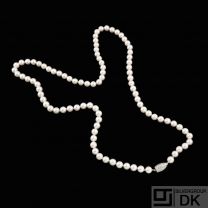 Chr. Rasmussen. Mikimoto-Pearl Necklace with 14k Gold Diamond-clasp 1.10 ct..
