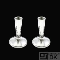 Evald Nielsen 1879-1958. A pair of Art deco Sterling Silver Candlesticks.