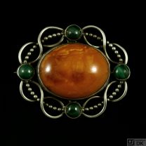 Otto Strange Friis. Art Nouveau Silver Brooch with Amber and Malachite. 