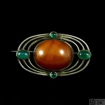 Otto Strange Friis. Silver Brooch with Amber and green Agates. 1920s