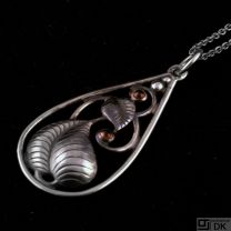Flemming Lund. Danish Silver Pendant with Garnets