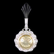 Carl M. Cohr. Silver Tea Strainer, partly gilded.