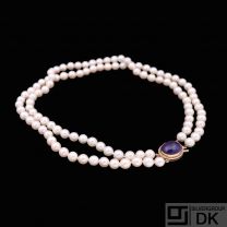 E. S. Cohn-Pålsson. Two-Strand Pearl Necklace with 14k Gold Lock with Amethyst.