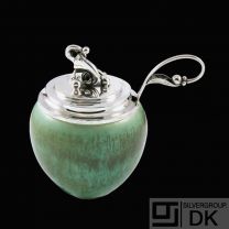 Saxbo - F. Hingelberg - Georg Jensen. Stoneware Jar with Sterling Silver Lid and Spoon.