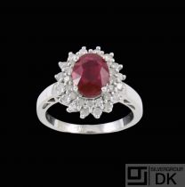 14k White Gold Cocktail Ring with Ruby and Diamonds.