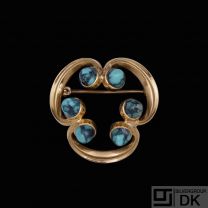 Karen Strand 1924-2000. 14k Gold Brooch with Turquoise.