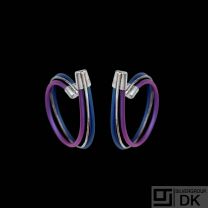 Kirsten Pontoppidan. Unika Sterling Silver Ear Hoops with Color-Oxidized Titanium.