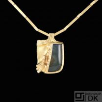 Lapponia. 14k Gold Necklace with Spectrolite - Björn Weckström 1988.