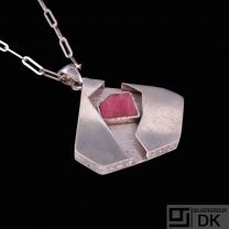 Lorilea Jaderborg. Sterling Silver Pendant with Tugtupite.