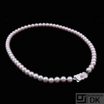 Mikimoto-Pearl Necklace with Silver Clasp.