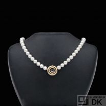 Ole Lynggaard. Pearl Necklace with 14k Gold Clasp with Diamond and Sapphire.