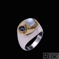 Ole Waldemar Jacobsen. Sterling Siver Ring with 18k Gold, Moonstone & Sapphire.