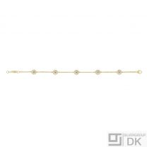 Georg Jensen. DAISY Bracelet. Gold plated Silver and five 7 mm daisies.