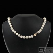 Pearl Necklace with 18k Gold Ball lock.