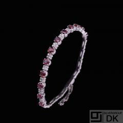 14k White Gold Bracelet with Rubies and Diamonds.