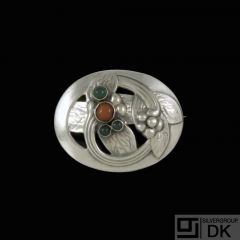 Georg Jensen. Silver Brooch #13 with Green Agate and Amber.